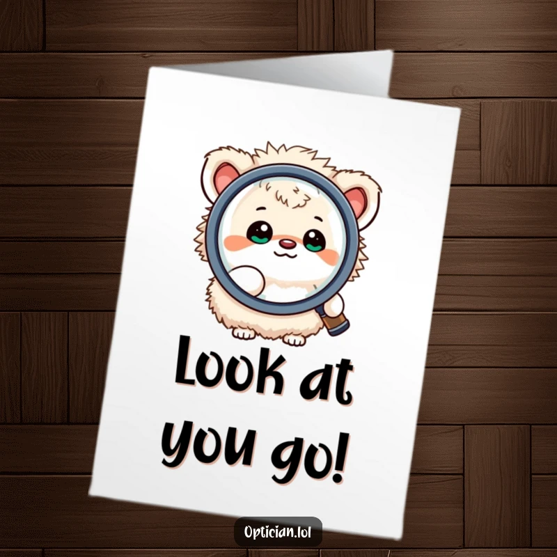 Funny Free Printable Congratulations Card: Small fluffy creature happily looking through a large magnifying lens, examining success.